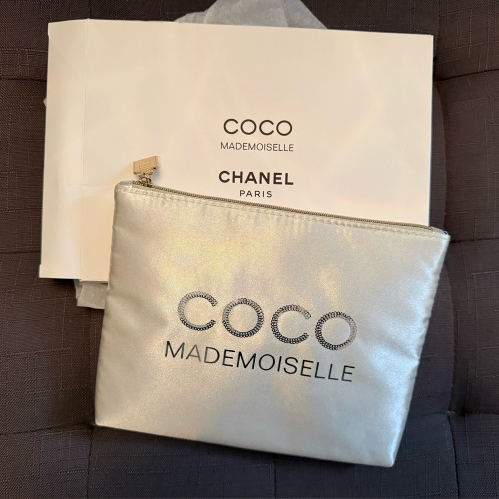 CHANEL Silver Pouch with Gold Charm